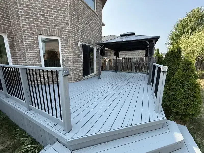 Grey composite deck painting with gazebo