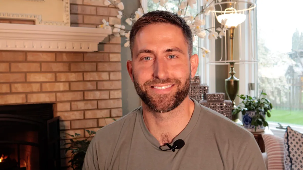 Photograph of Dr. Jon Evans, a doctor of physical therapy and fitness instructor, smiling and looking caring