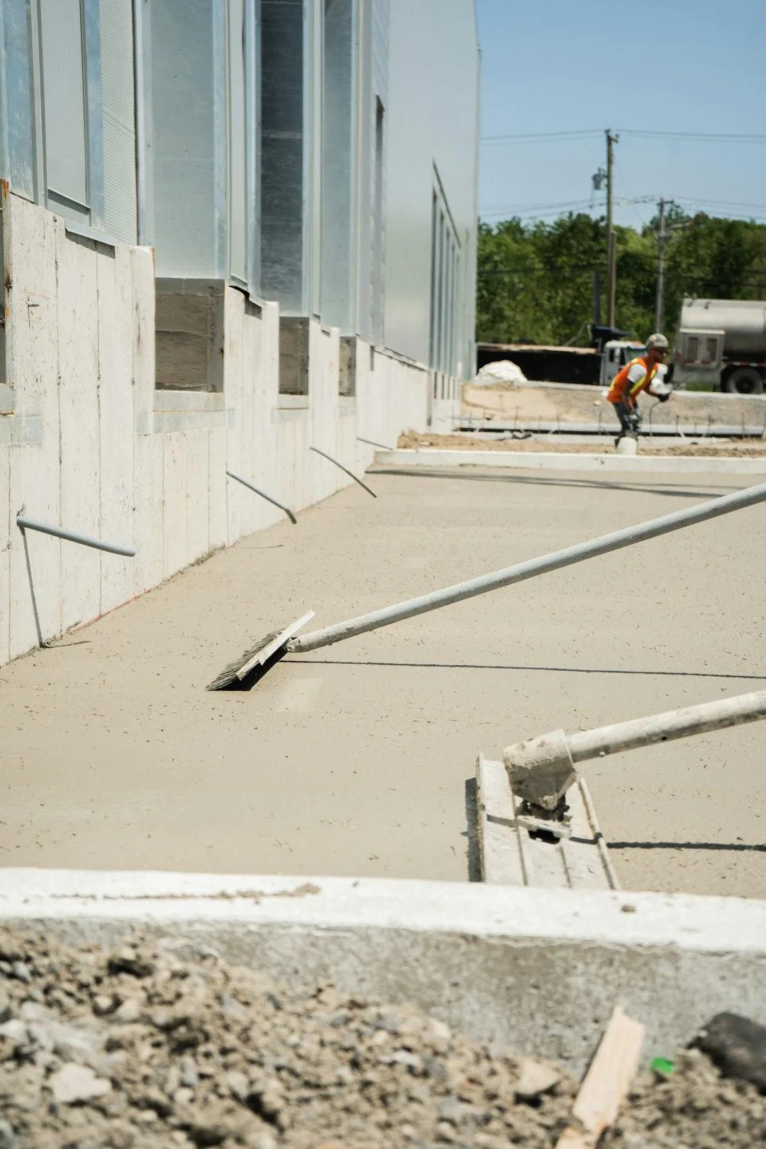 concrete building slab being smoothed out with squiggly