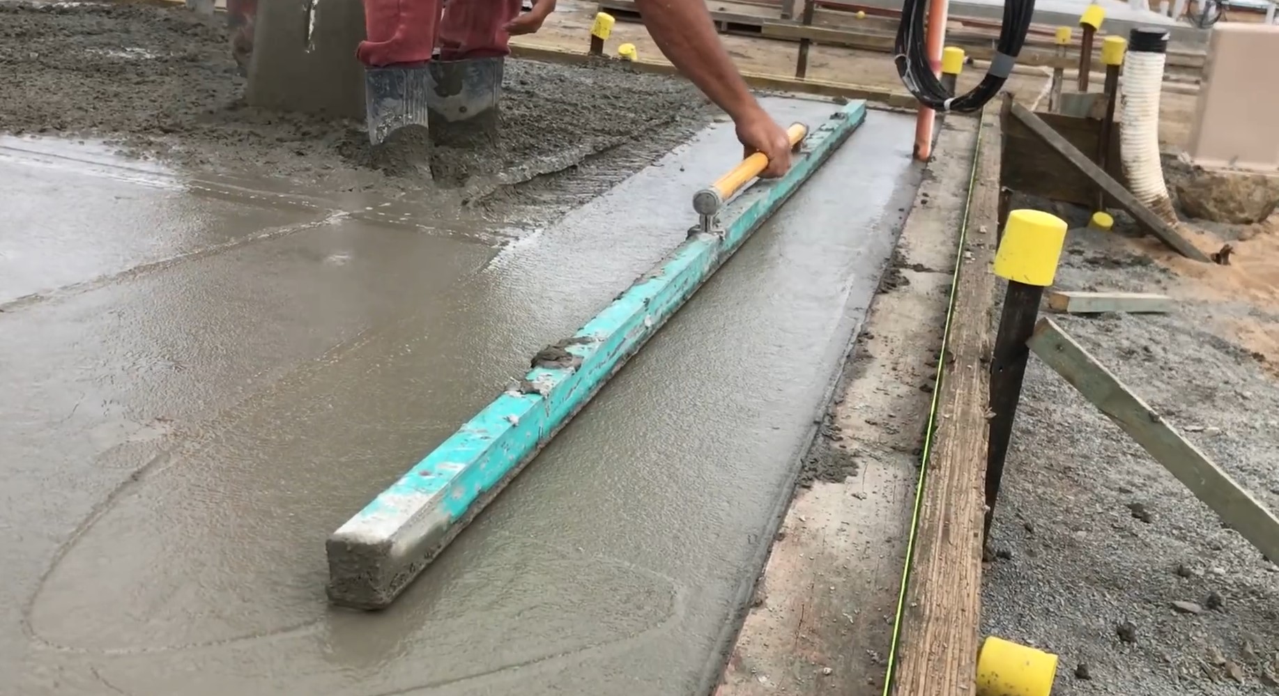 green scree bar levelling and smooth concrete out on a concrete base