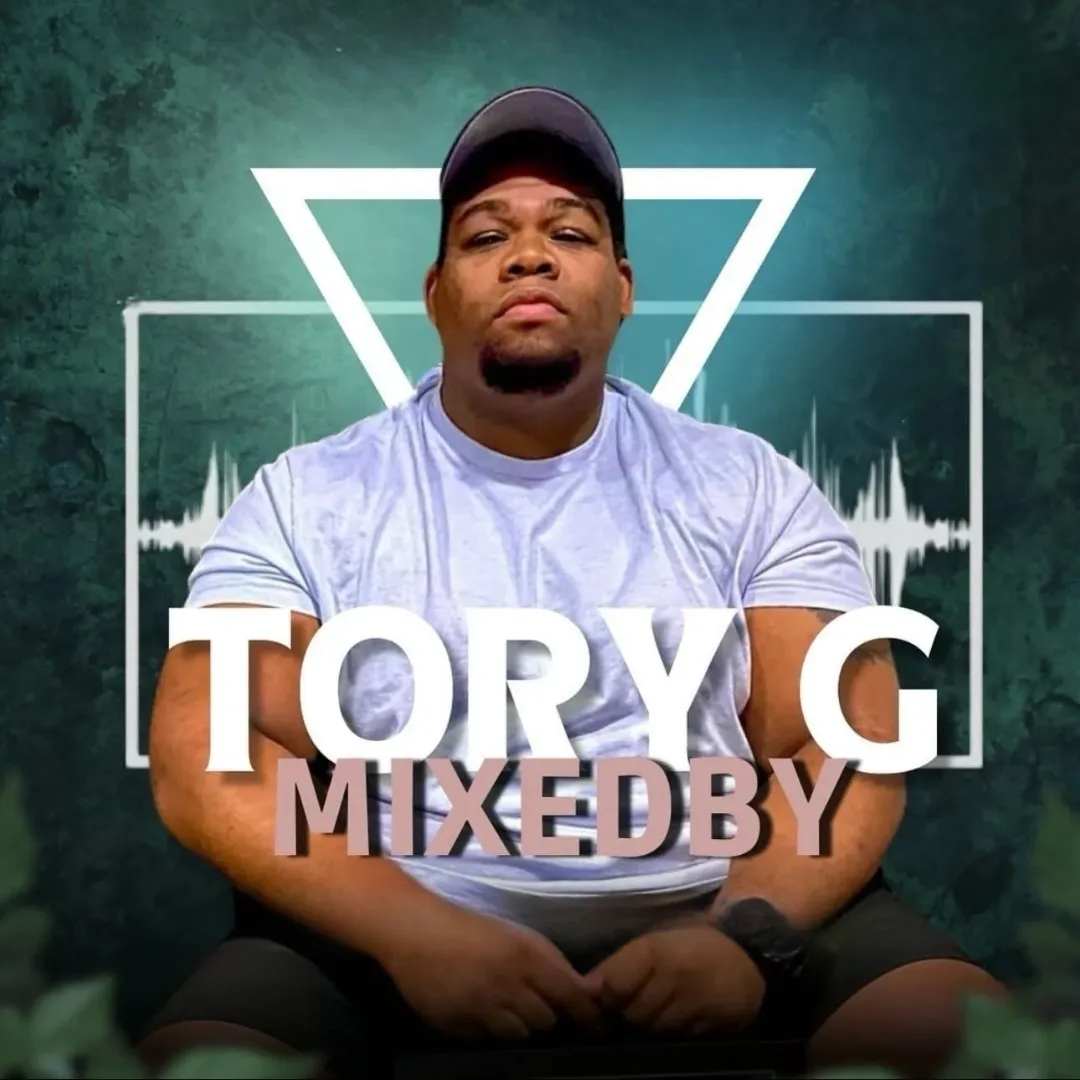 a person sitting in front of a laptop computer