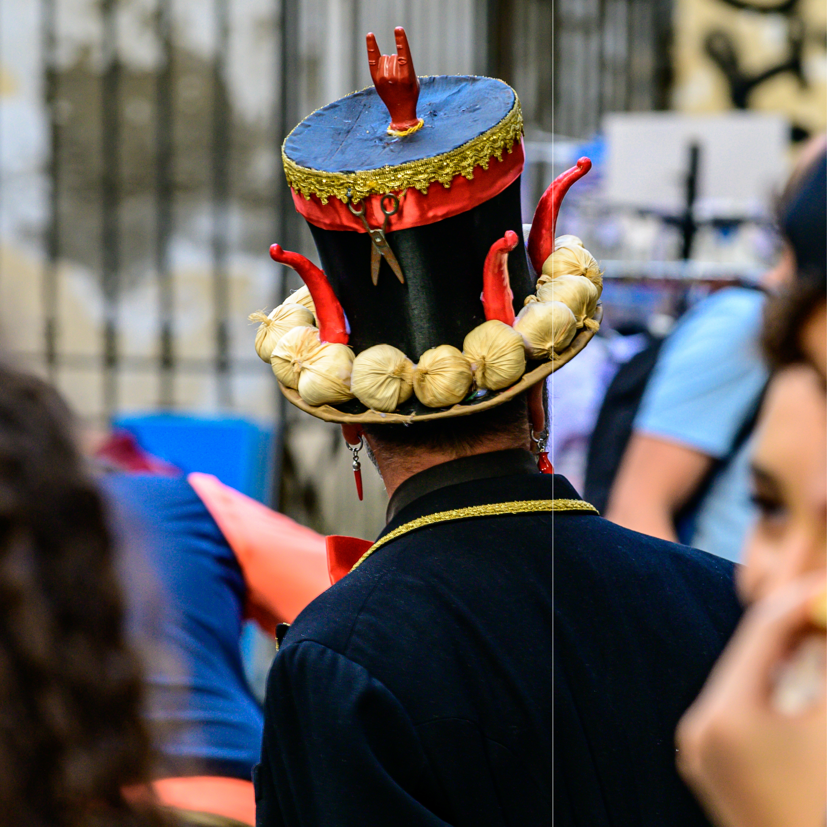 Children playing in a Naples piazza, joyful community moment.