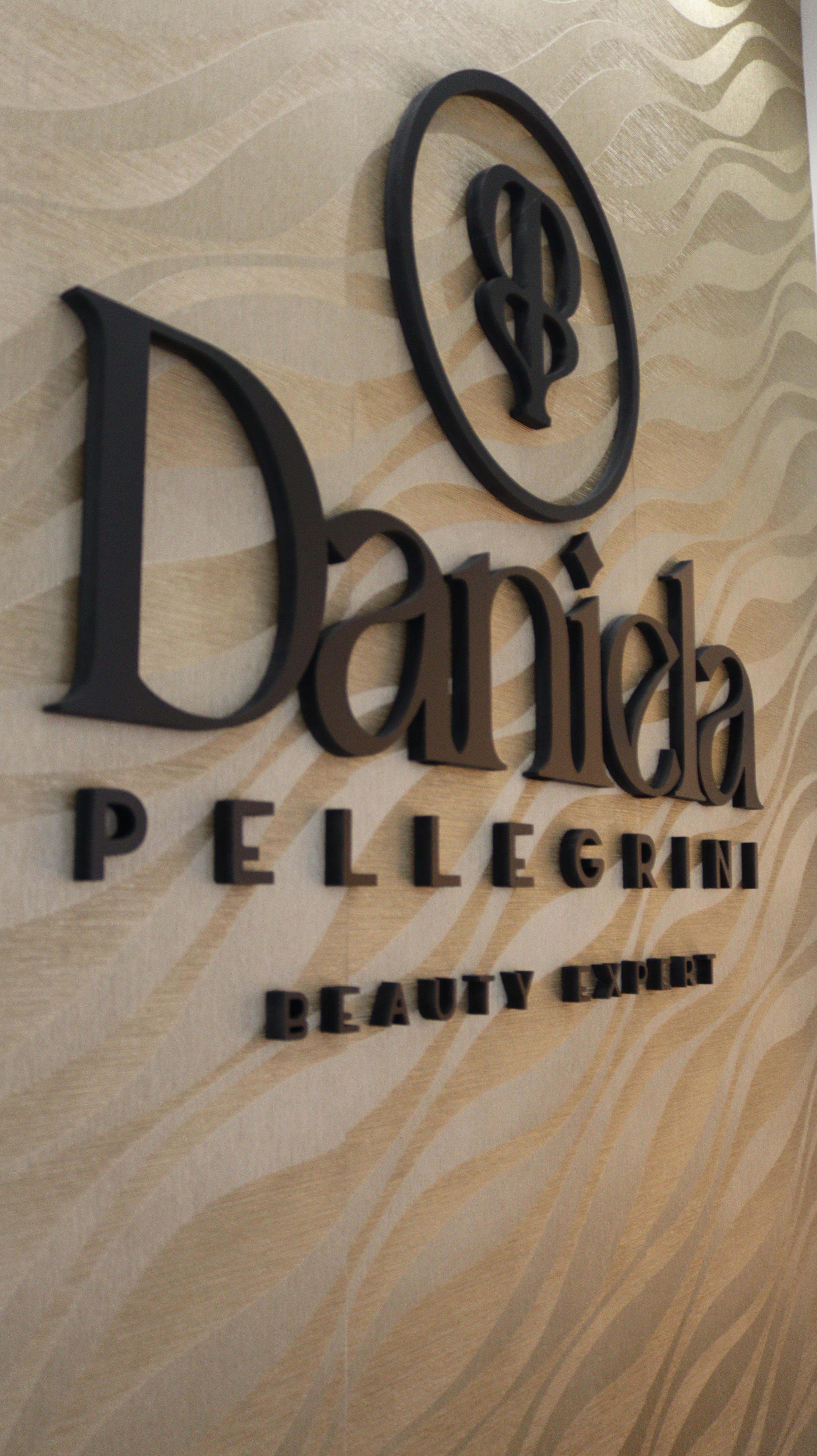 a hair salon with chairs and mirrors