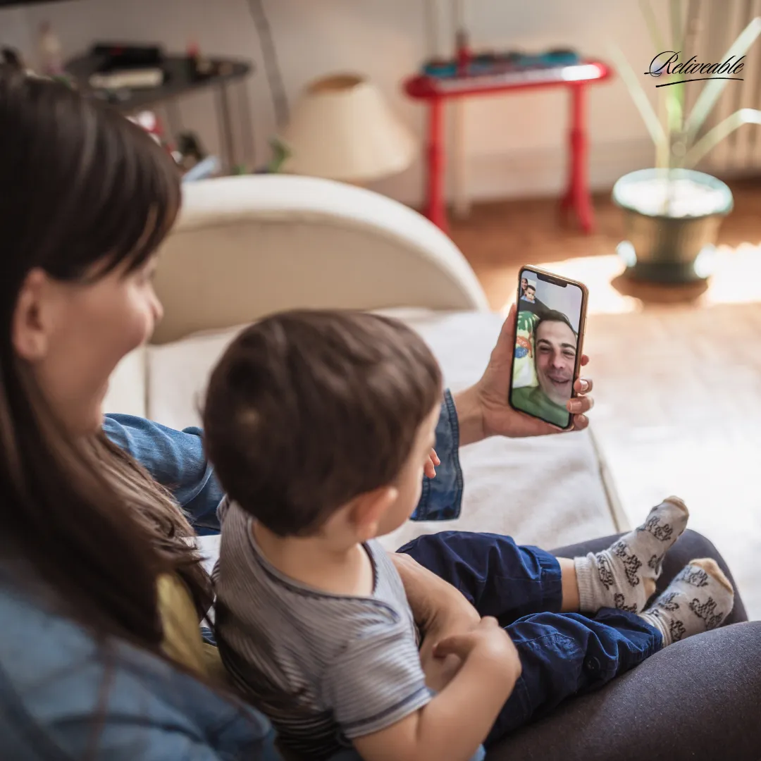 a women and her child reconnecting with their father and husband using ReLiveable's interactive voice memorial service