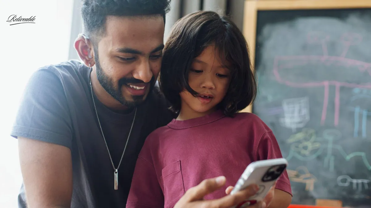 a father and daughter setting up there legacy texting with ReLiveable