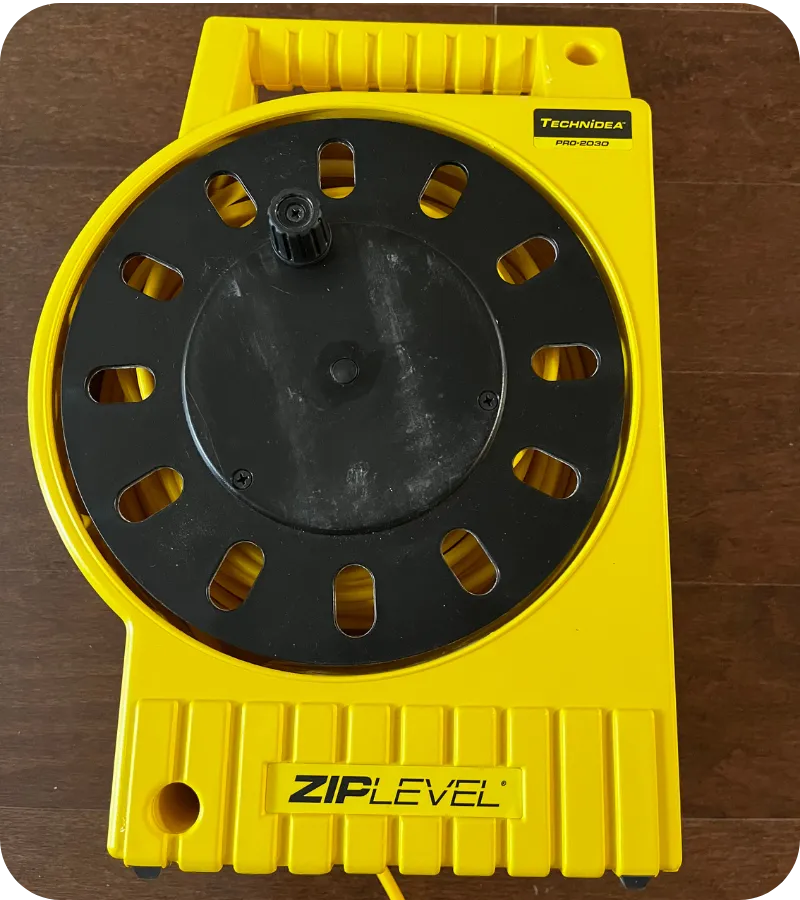 Zip Level foundation measurement tool used during a home inspection in Fort Worth TX to assess floor elevation and foundation integrity