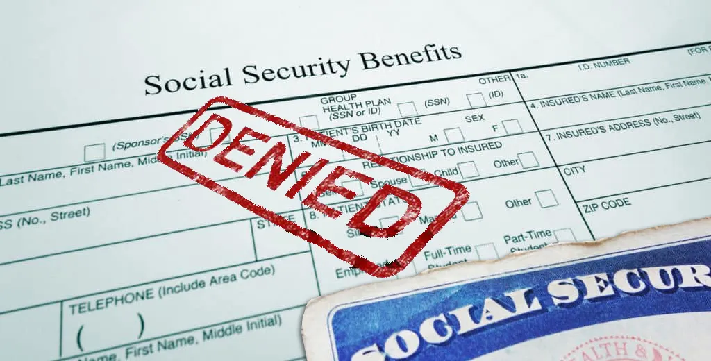 person holding love word cutout paper