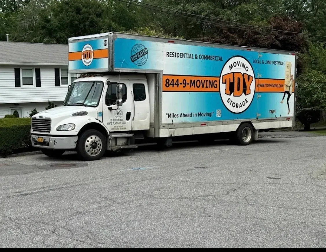 Professional movers wrapping furniture for local and long distance moving in Brooklyn New York