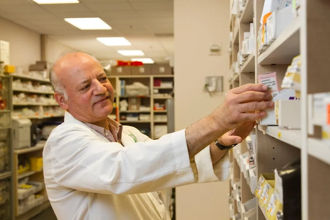 pharmacist organizing medication