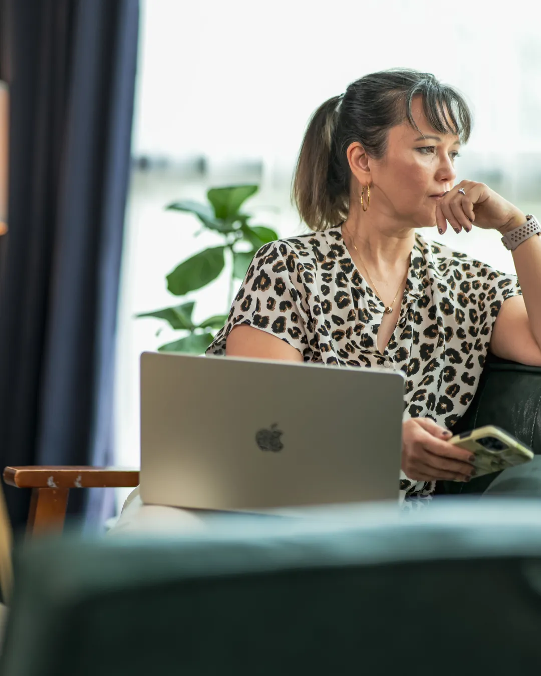 Editorial portrait of a confident woman in her 50s embracing clarity and cognitive renewal