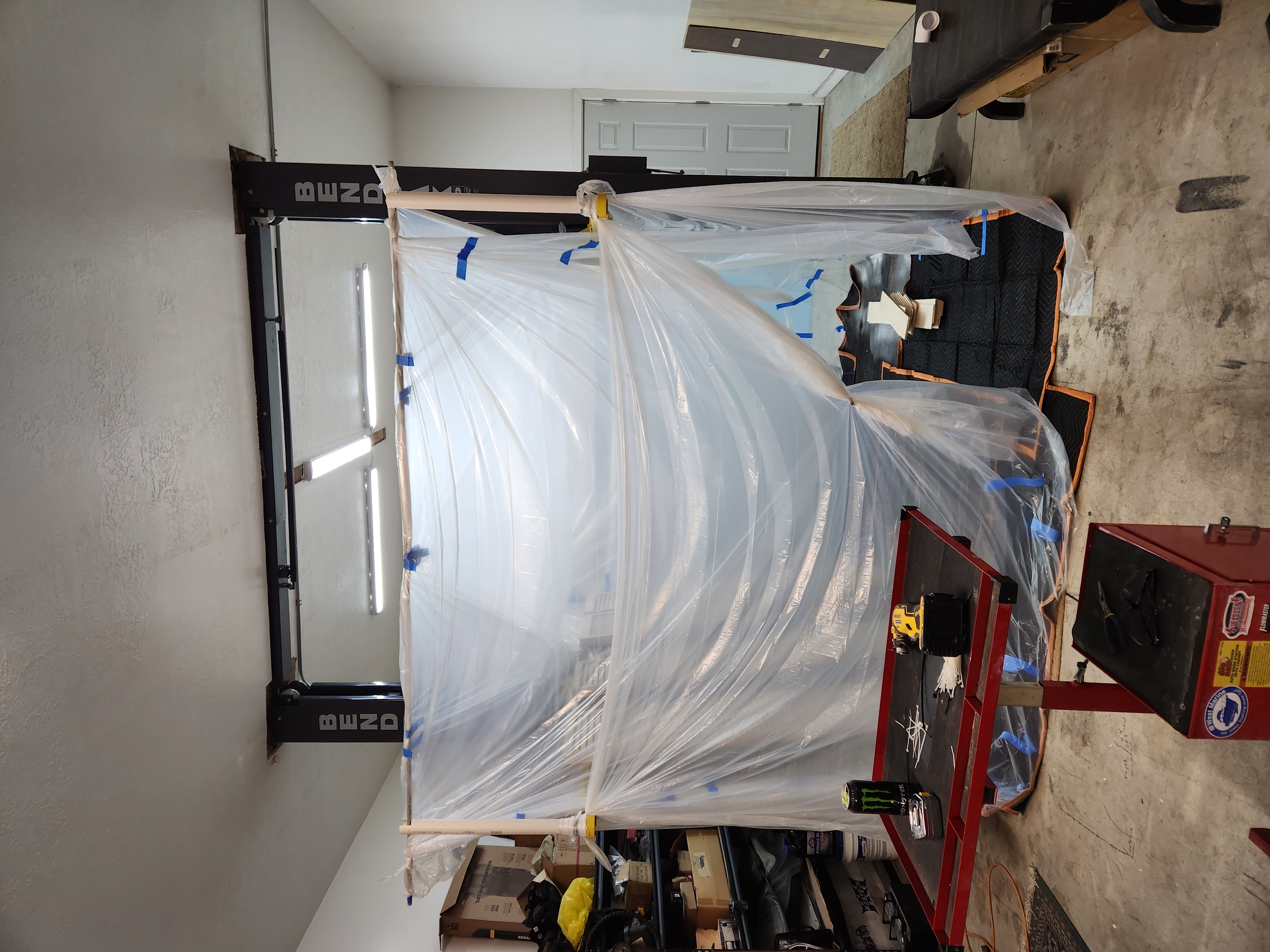 Plastic sheeting protecting the work area during a project