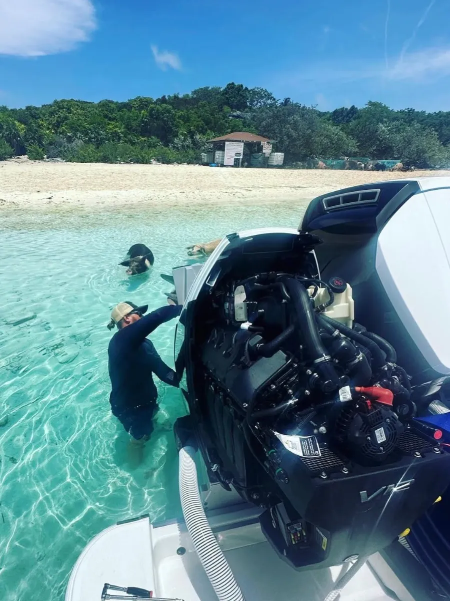 Blye fixing a outboard in bahamas