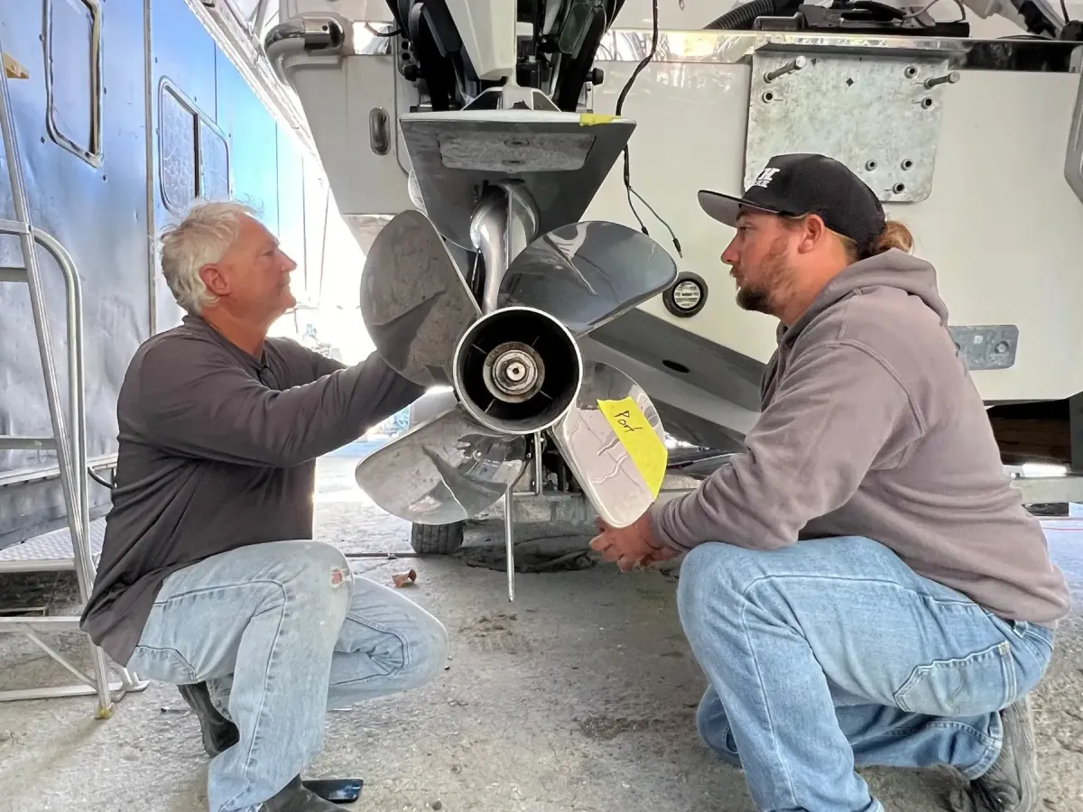 Blye and Tommy "chief" hofstetter diagnosing a boat at BTH Marine