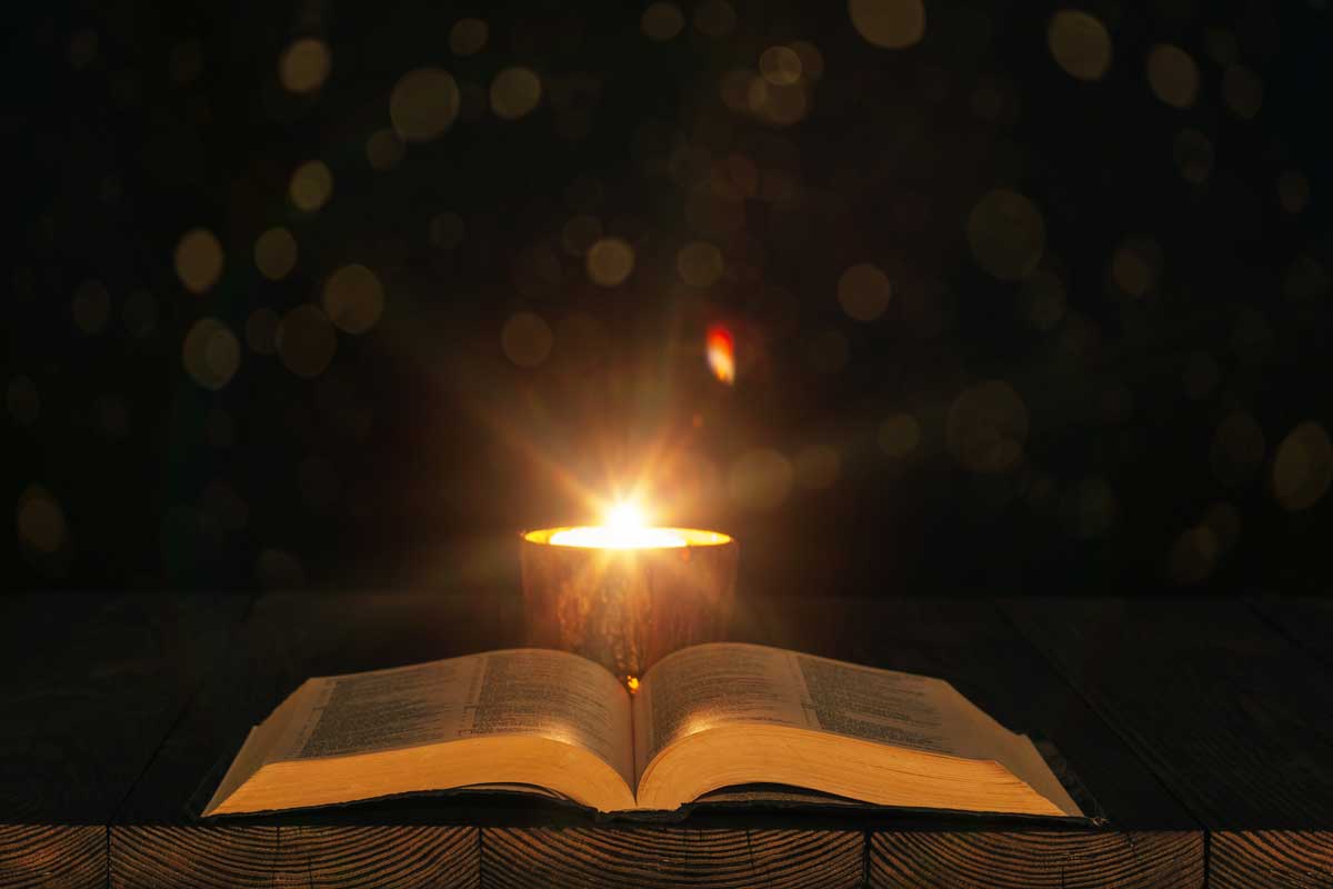 Bible and candle