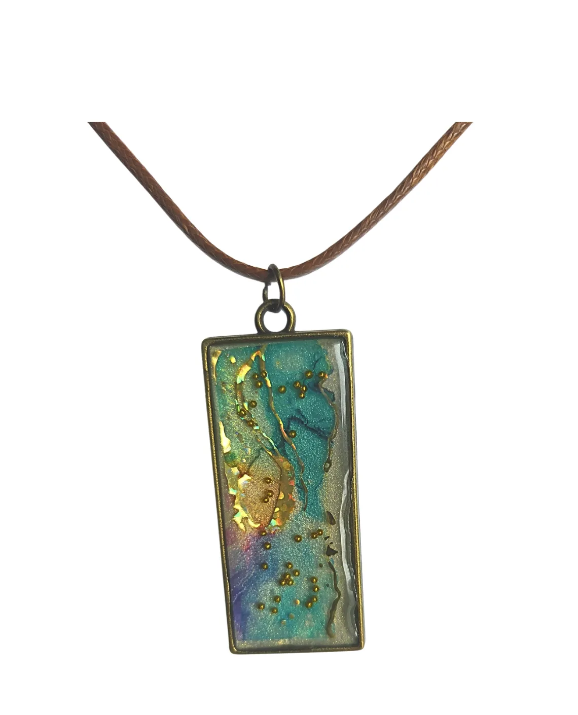 Close-up of a gold ring with gemstones from Aurora Jewelry