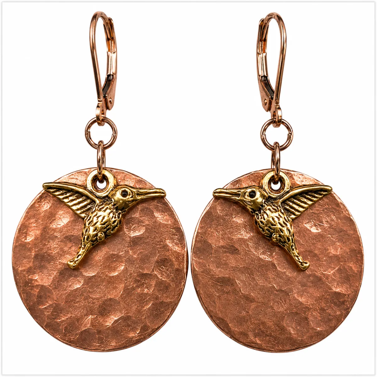 Minimalist gold necklace displayed on soft fabric