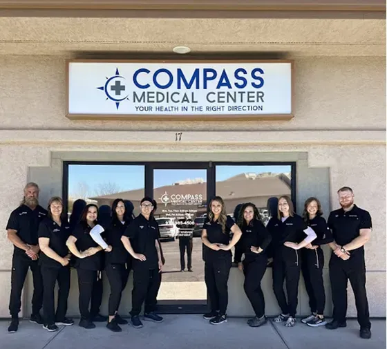 Compass Medical Center Team in front of clinic