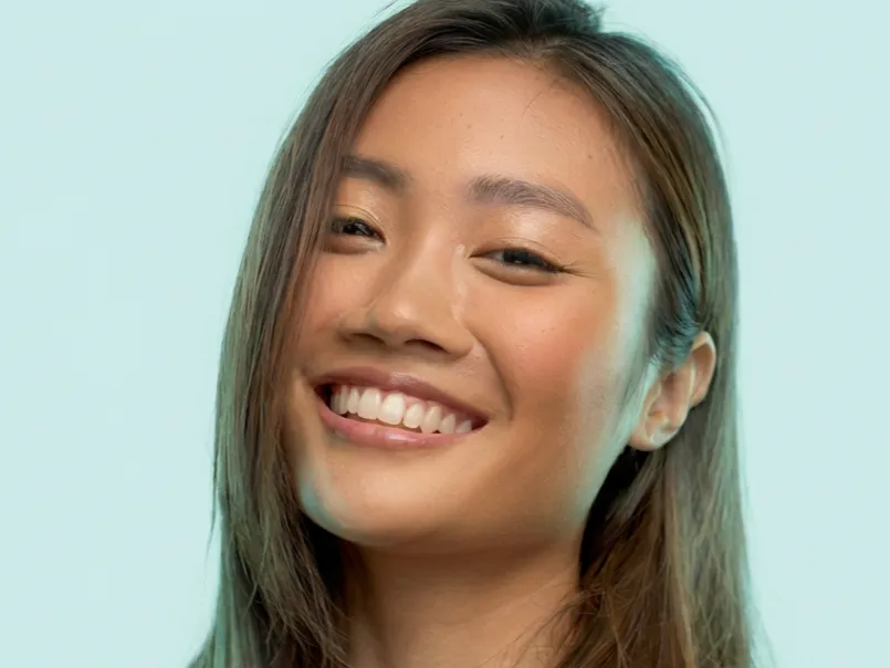 adult male smiling with confidence