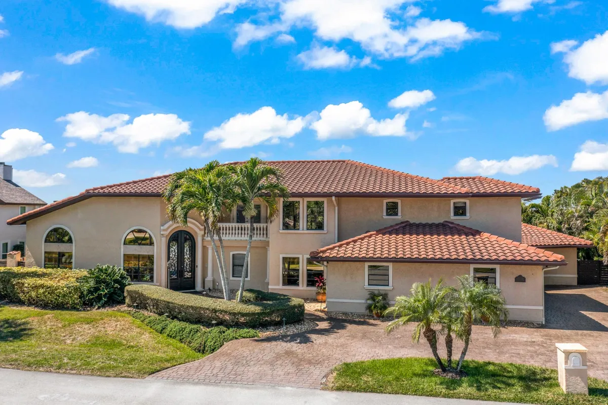 Front exterior of 762 Loggerhead Island Dr in gated Tortoise Island community