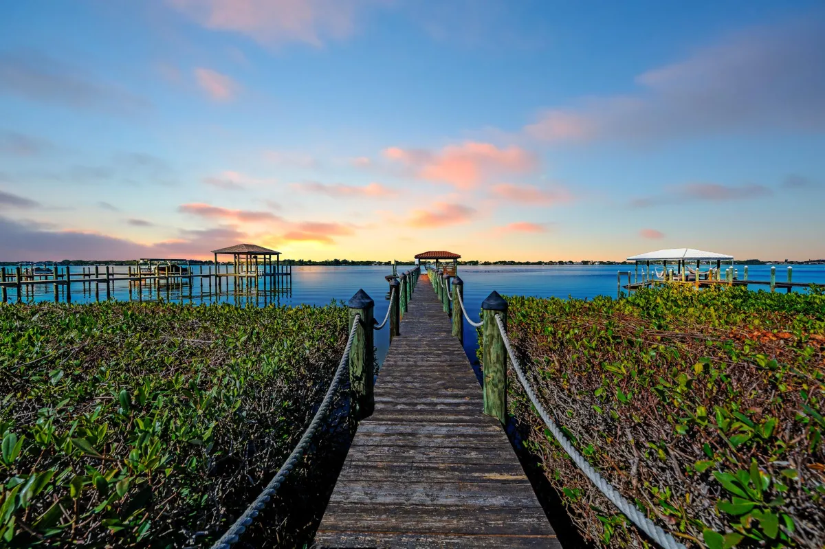 Sunset view from private dock in Tortoise Island waterfront estate