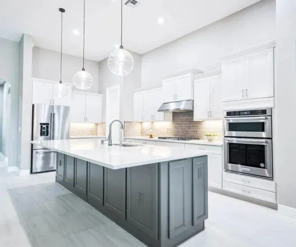 gray steel 3-door refrigerator near modular kitchen