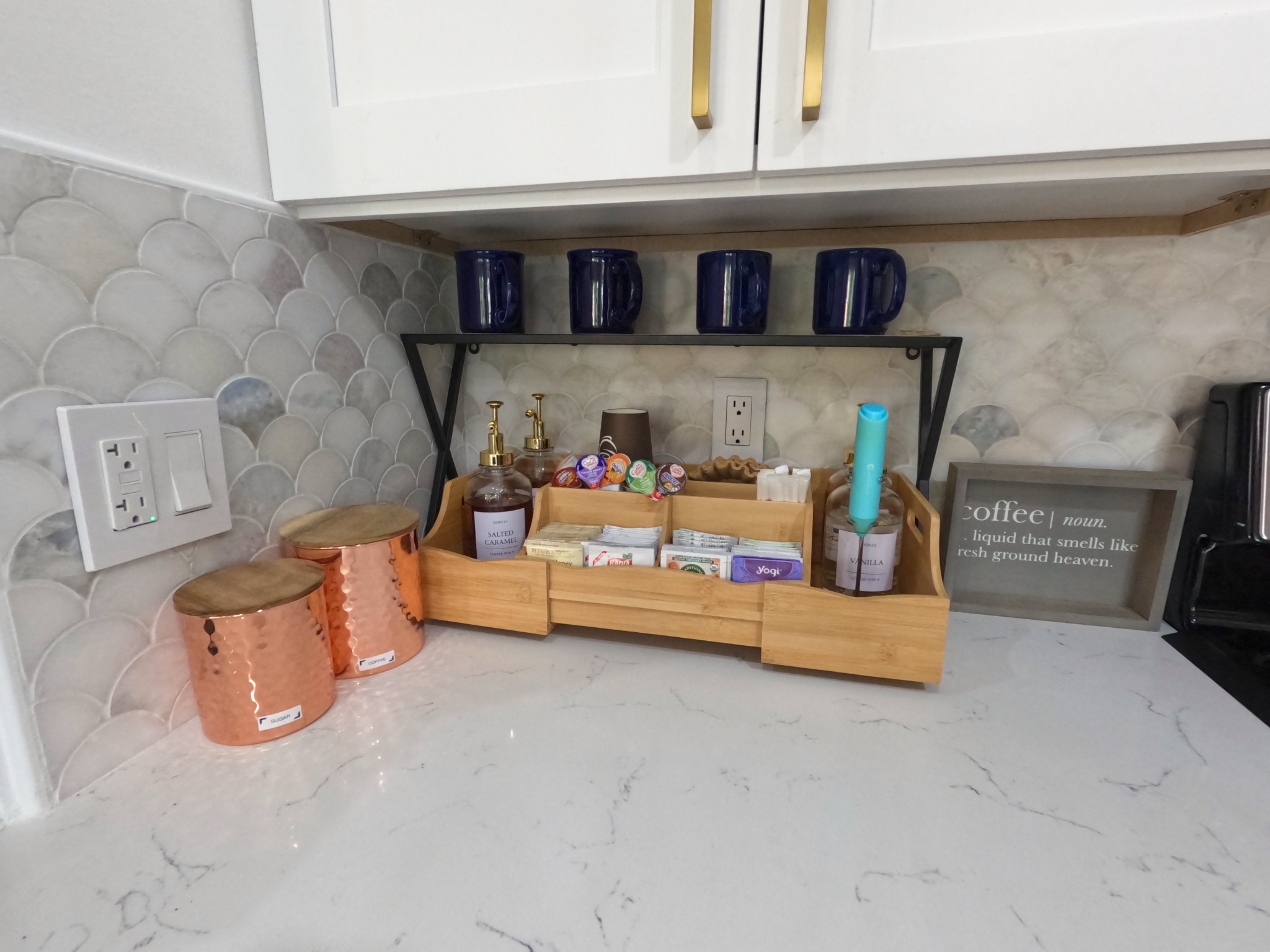 Morning coffee bar stocked with mugs and Keurig, ready for balcony birdwatching at Royal Palm Retreat Naples monthly condo"