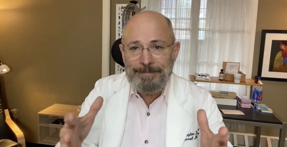 Dr. Doug Pucci explaining clinical evaluation process in office, Oradell, Bergen County, NJ