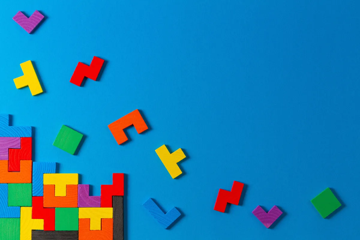 Blocks have fallen to build a strong structure but some blocks have fallen outside of the structure or do not fit