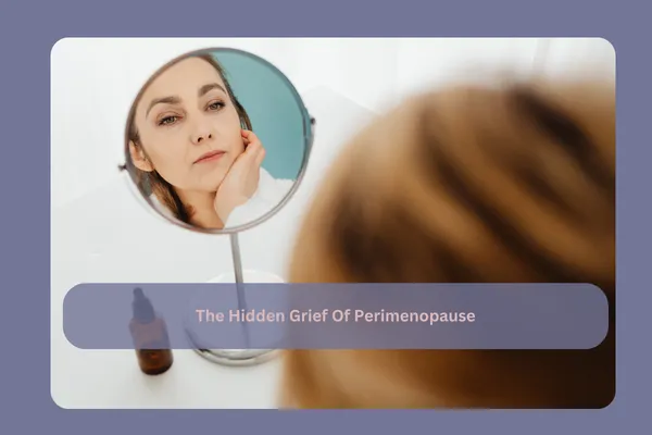 Woman in midlife sitting thoughtfully in front of a mirror, reflecting on emotional and hormonal changes during perimenopause.