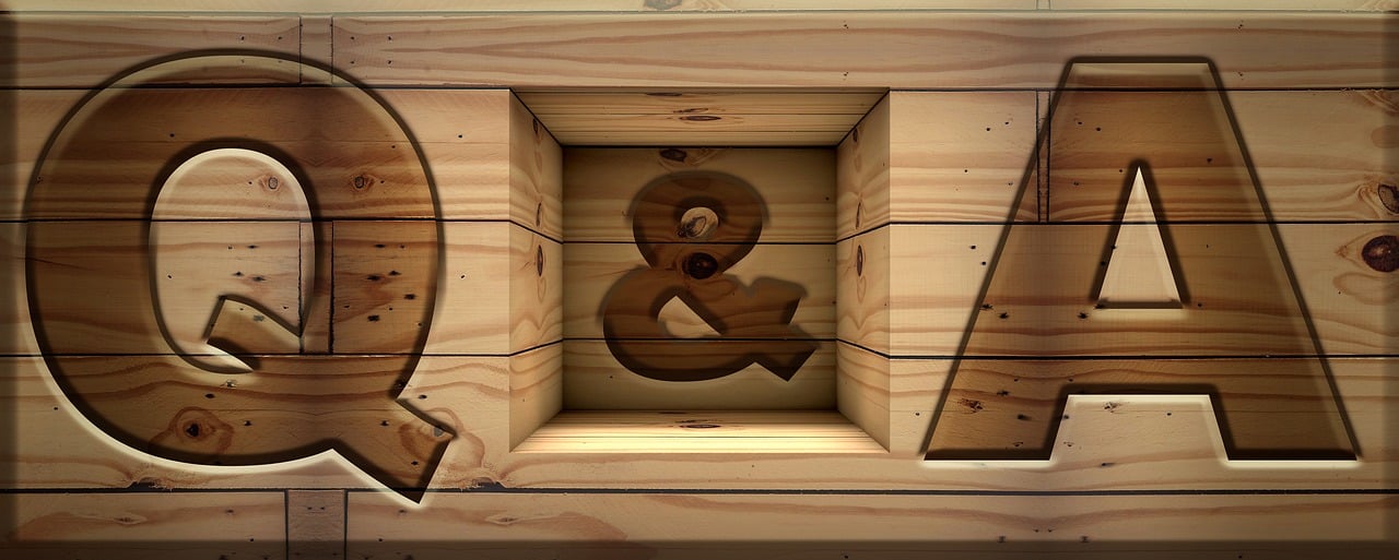 person holding orange flower petals