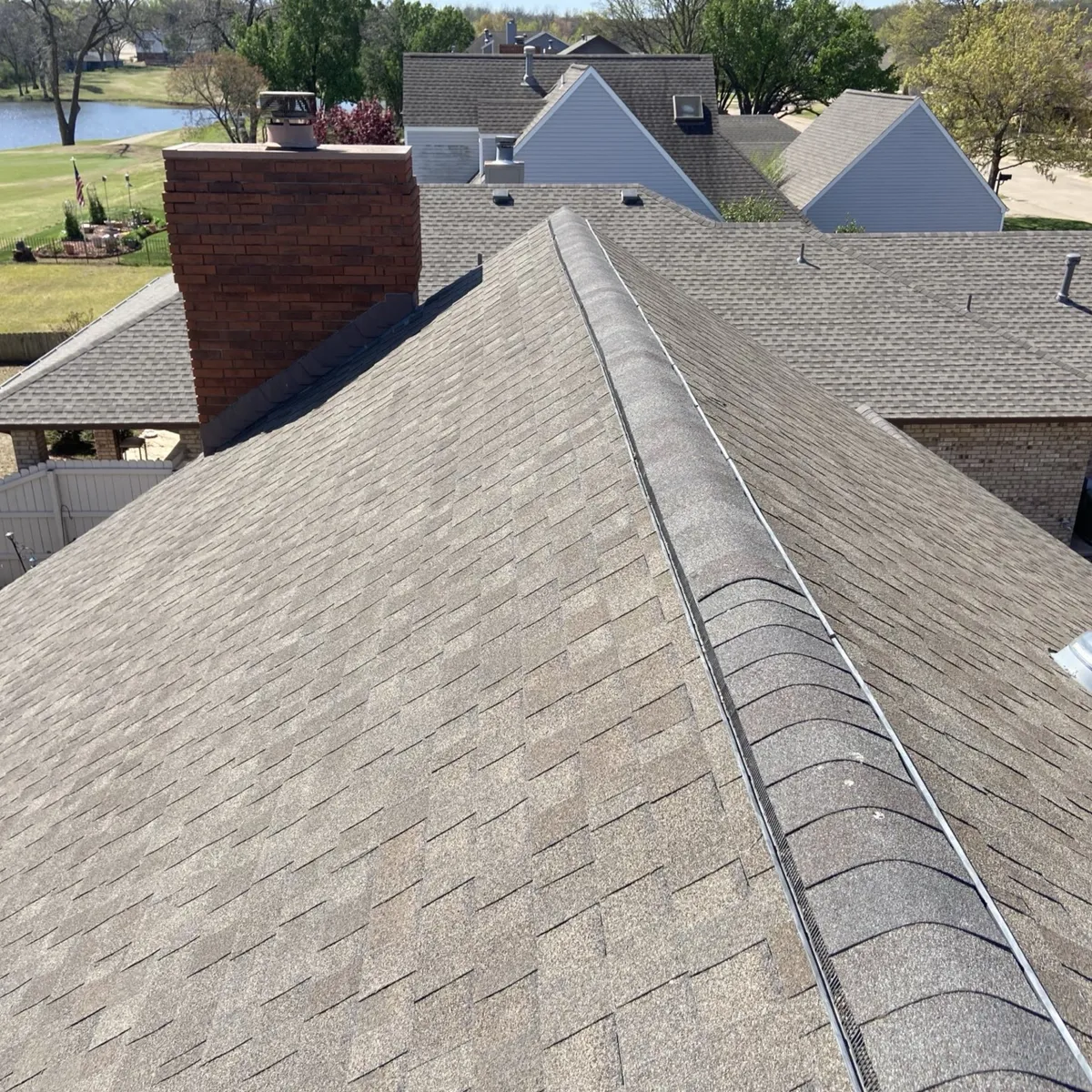 Finished Shingle Roof Replacement With Chimney In Oklahoma