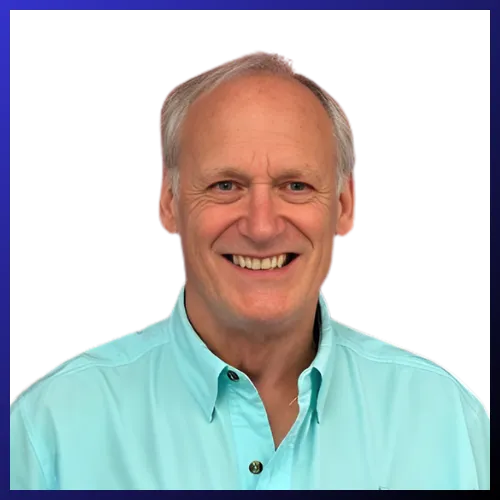 A large group of people gathered indoors at an event.