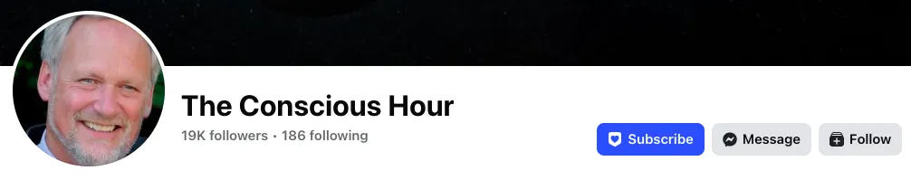 A large group of people gathered indoors at an event.