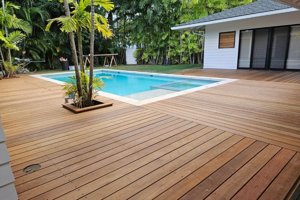 A vibrant illustrated map of Hawaiʻi highlighting Oʻahu, Maui, and the Big Island with icons representing homes, businesses, and construction, set against a blue ocean background.