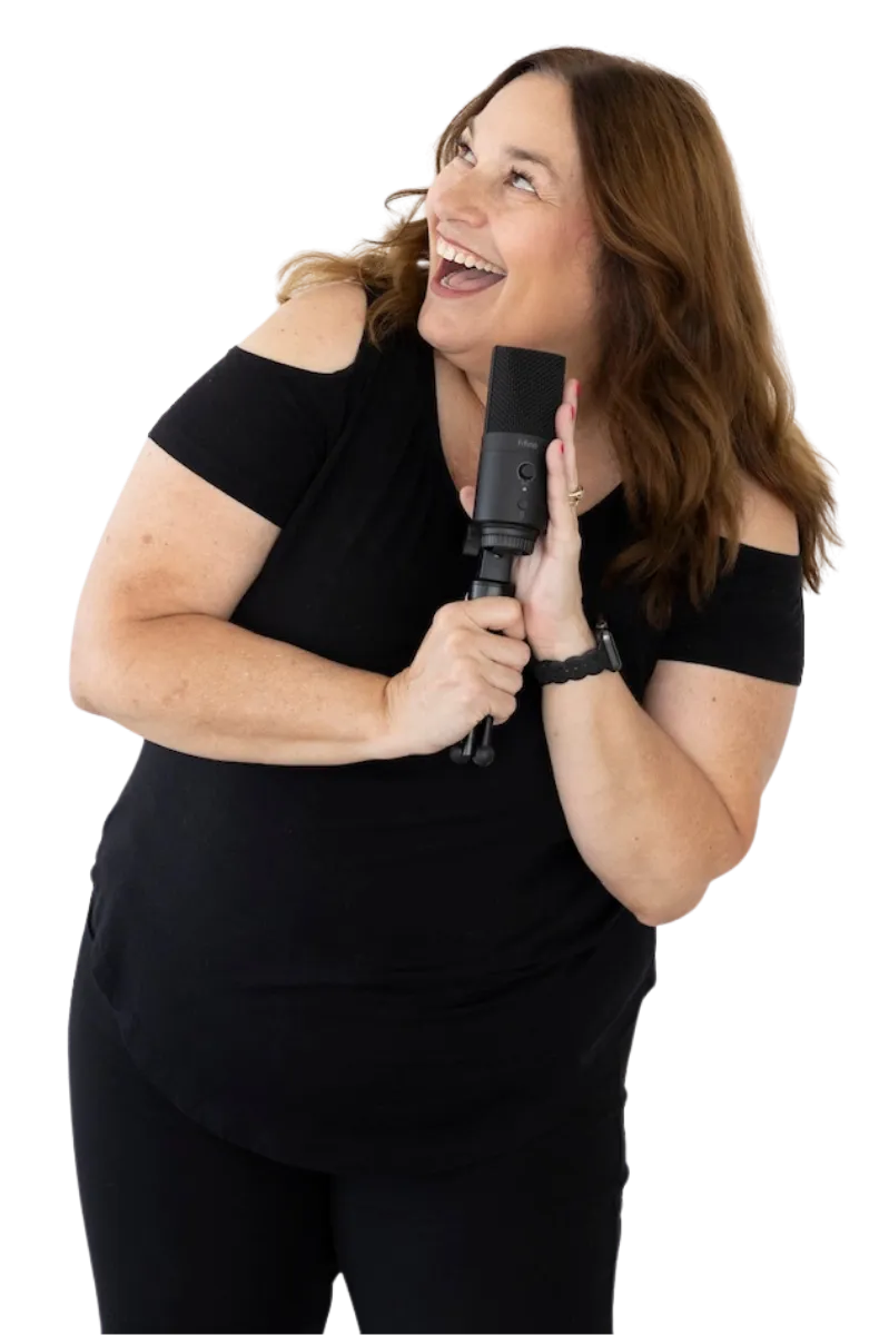 pinterest educator Jen Vazquez holding a microphone raising her hand and yelling Wooo cheering on people to use Pinterest to market their business