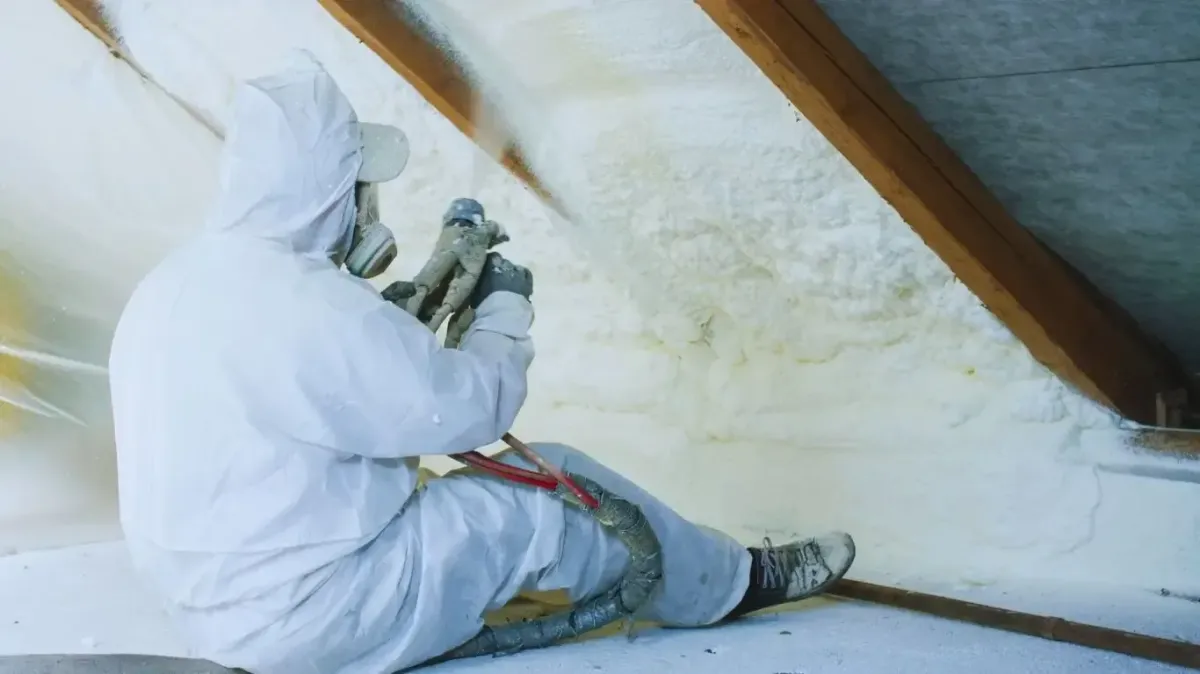 Installing crawl space open-cell spray foam insulation in Raleigh for energy savings and moisture control