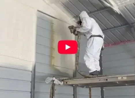 Spray foam technician insulating metal wall to prevent moisture and energy loss in Raleigh, NC by Energy Saving Insulation