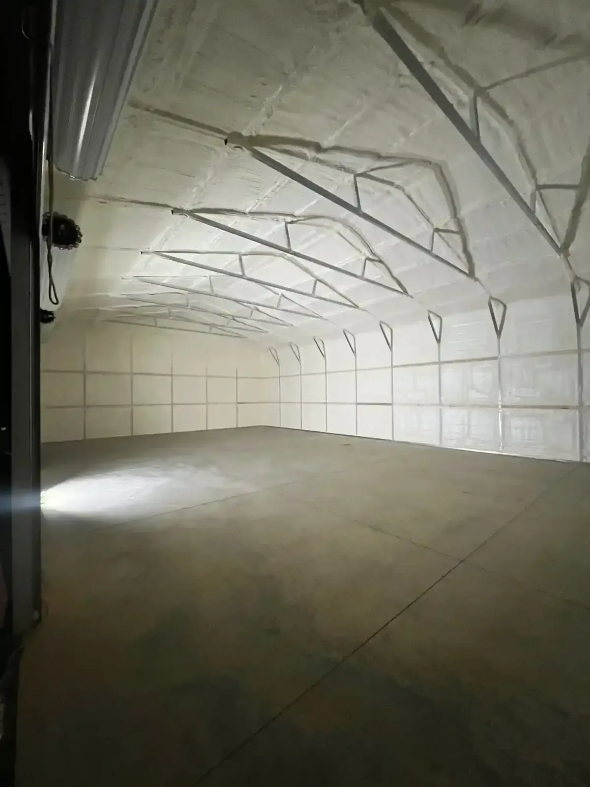 Closed-cell spray foam applied to interior ceiling and walls for full thermal protection in Raleigh, NC by expert insulation contractors