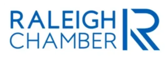 Blue Raleigh Chamber logo with bold uppercase text and stylized letter R on right.