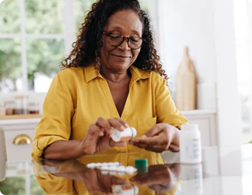 Older woman reviewing medication