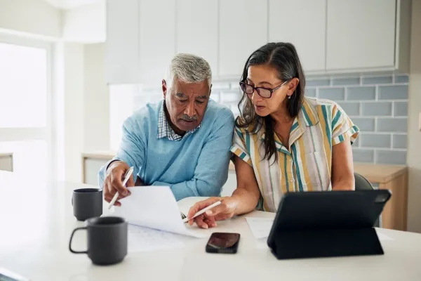Family Reviewing Insurance