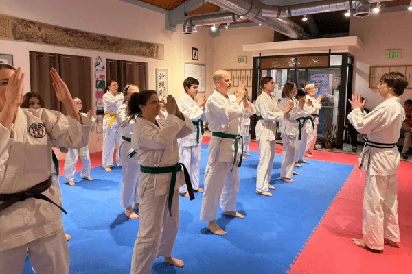 adults practicing karate in colorado springs class