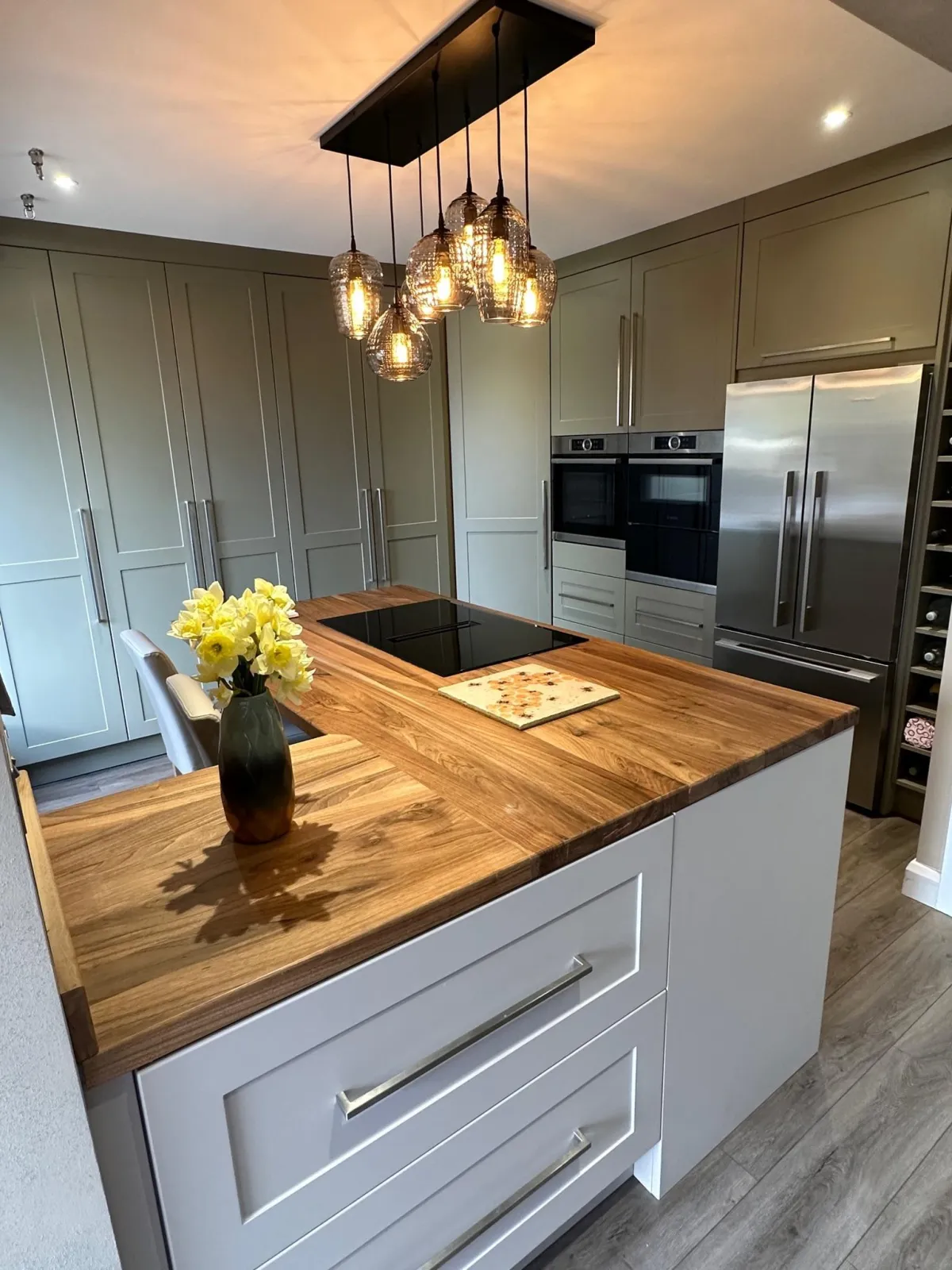 Bespoke custom built shaker style kitchen with oak worktop and island seating in Yorkshire