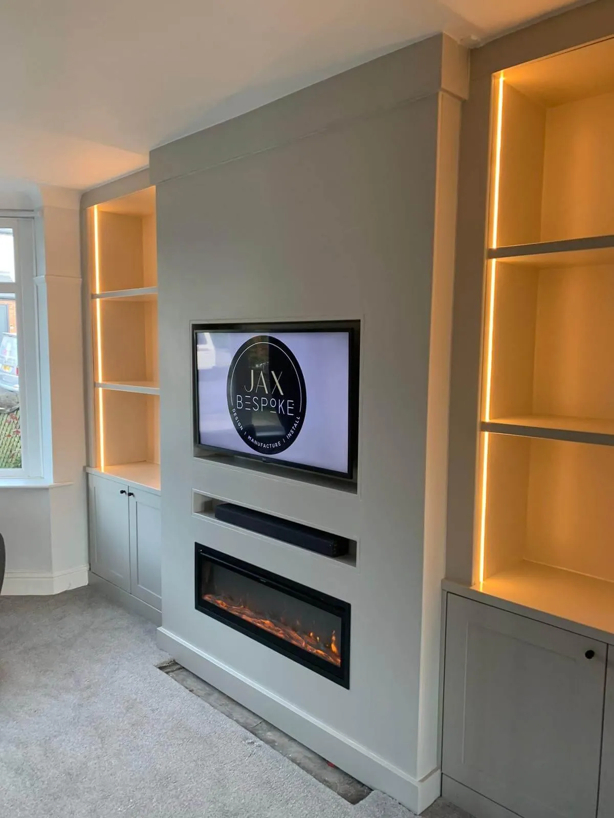 Luxury media wall - plastered center with bespoke alcove units by JAX Bespoke Leeds