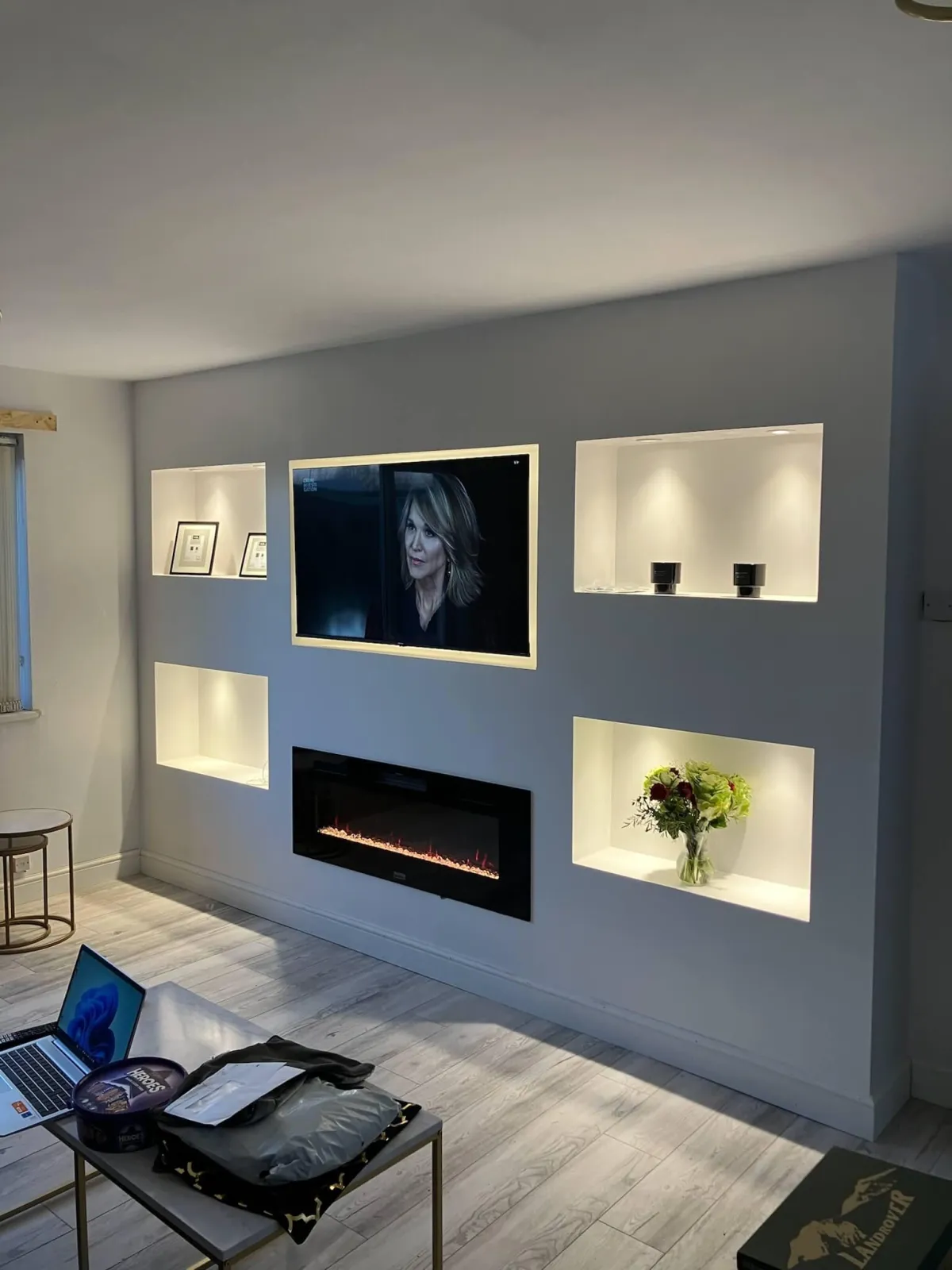 Full width plastered media wall with decorative alcoves - luxury TV installation by JAX Bespoke Wakefield