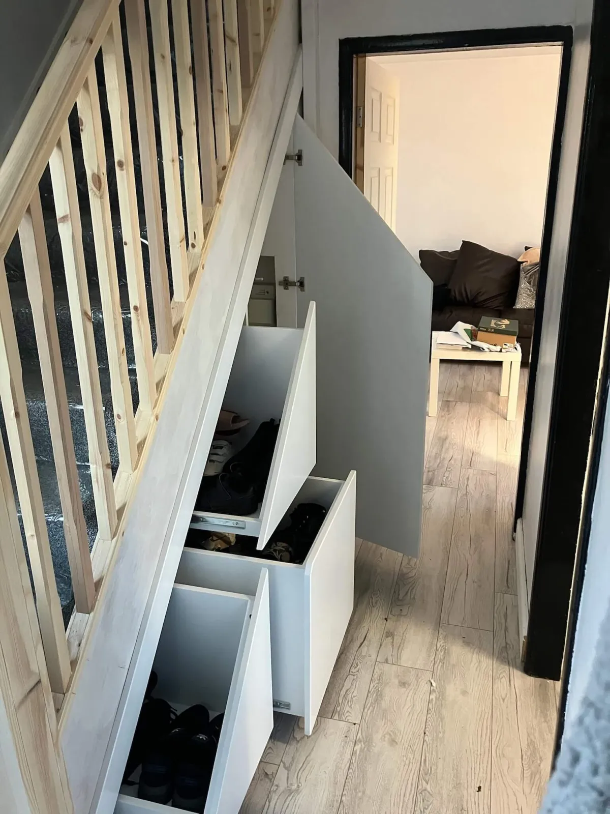 Three-drawer under-stair unit with tall storage door - custom combination design by JAX Bespoke Leeds