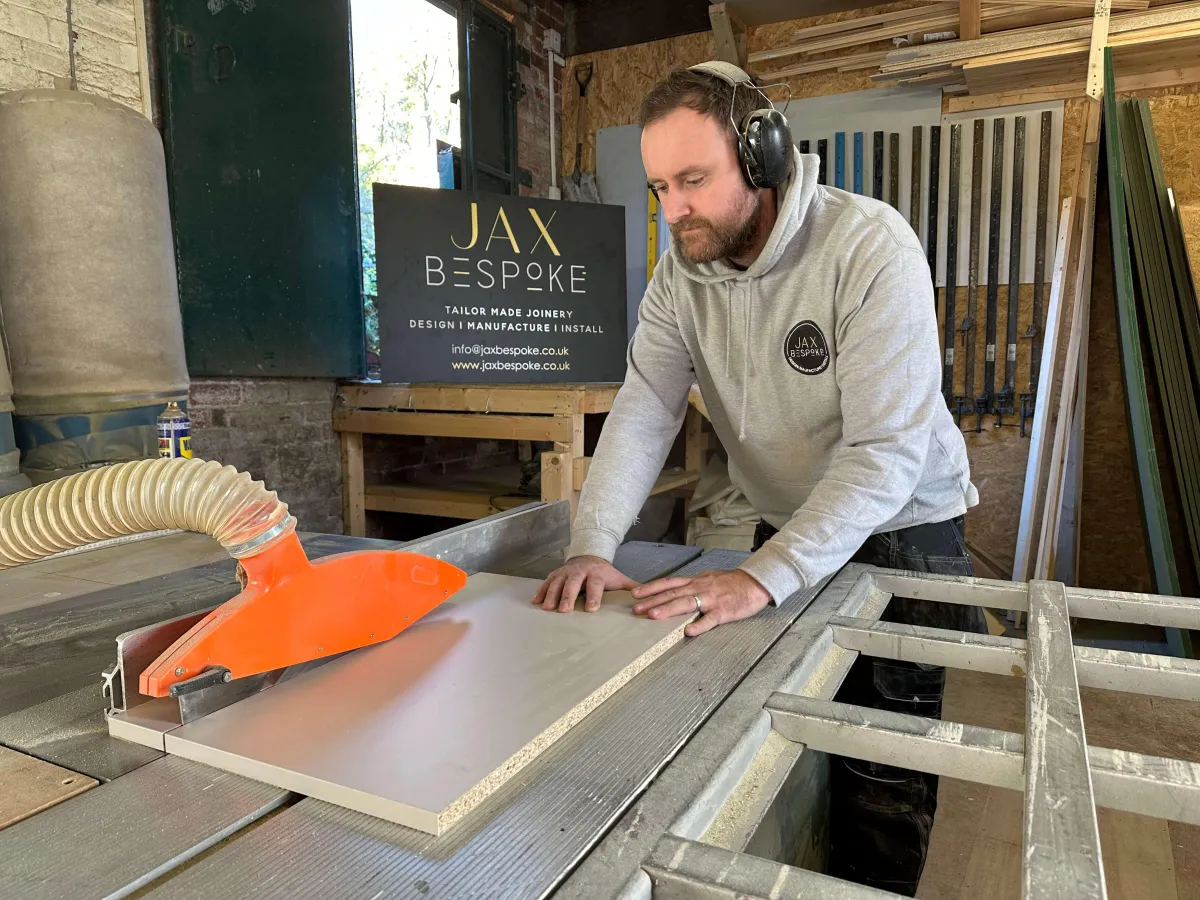 Jack Westmoreland at work in Wakefield - JAX Bespoke workshop, using table saw with dust extraction