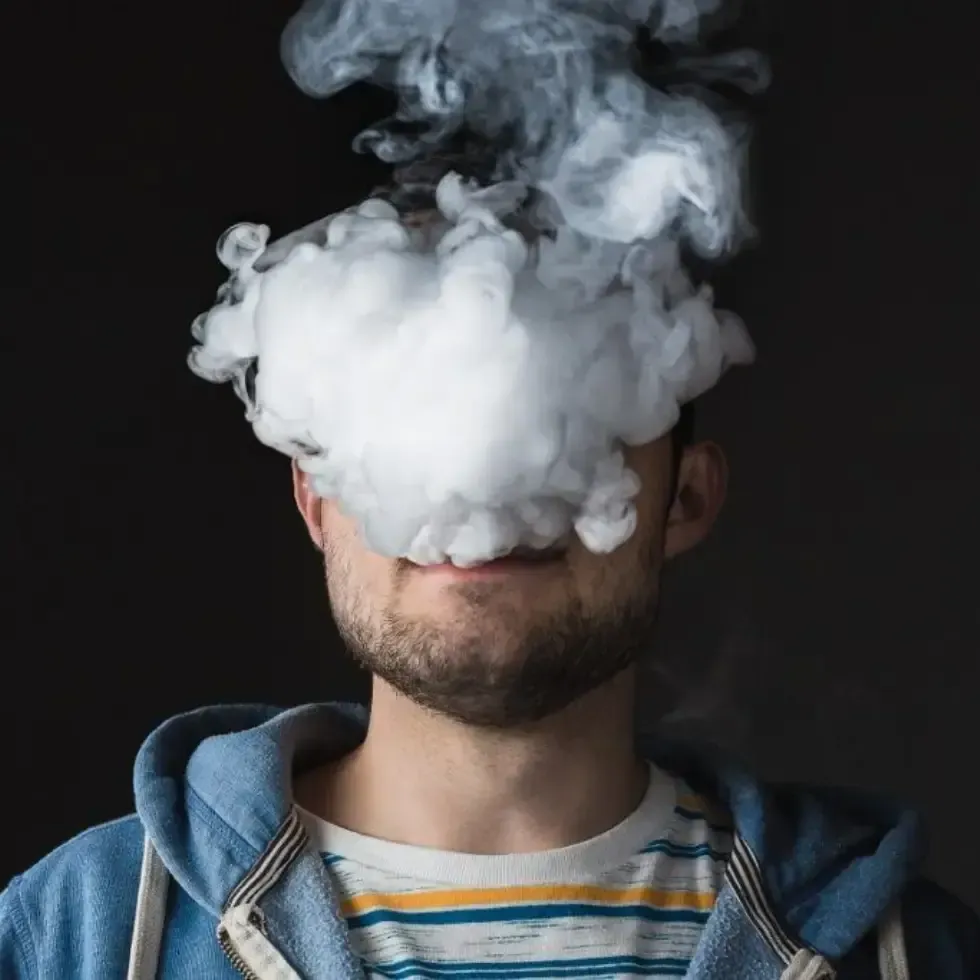 Man Vaping - Sterling Tobacco Vape & Glass
