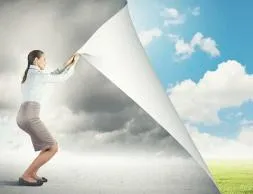 a woman pulling back the cover which reveals a bright and sunny landscape