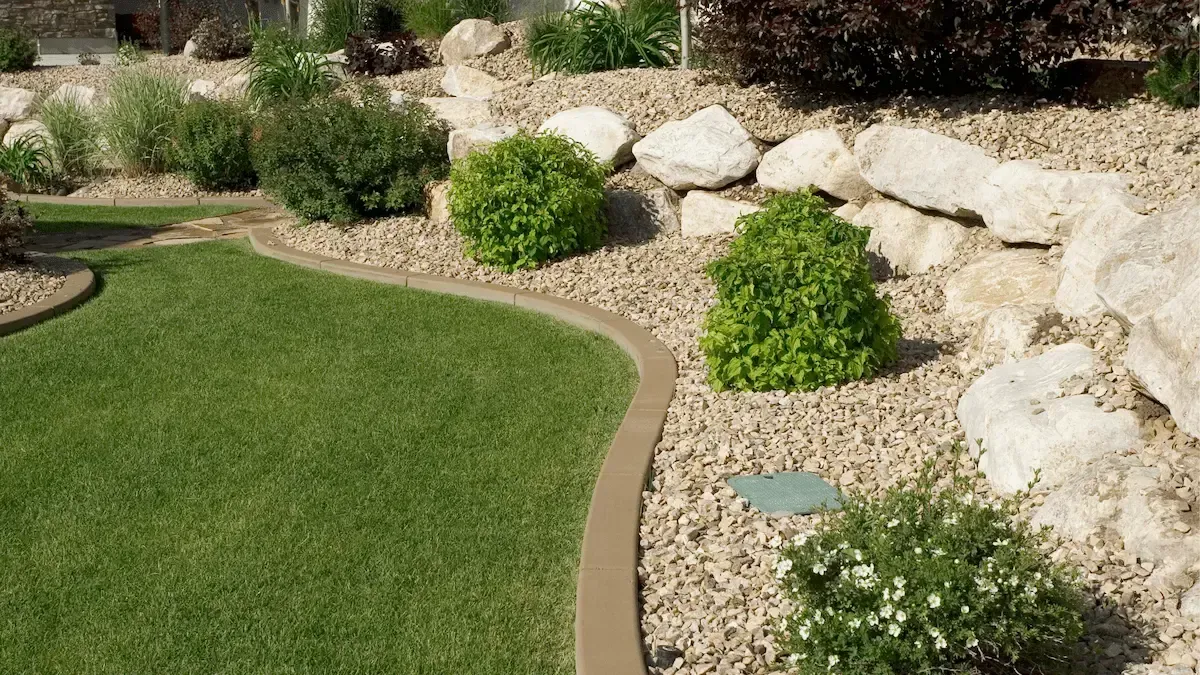 Freshly mulched front yard with manicured lawn and trees - Perfect Trim Lawn & Landscaping - lawn care and mulching services in Antioch
